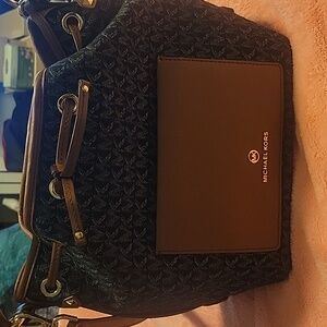 Micheal kors denim  monogram hand bag trim in brown medium  crossbody  bag